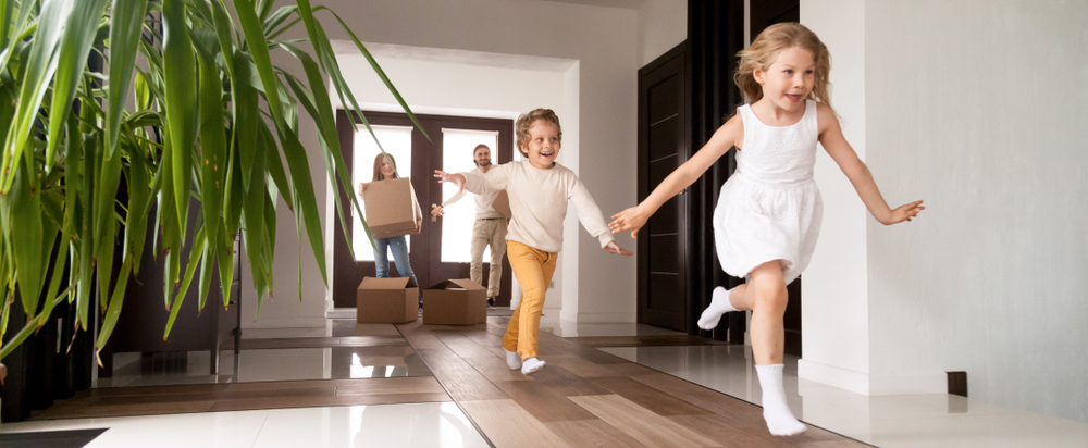 Kids running happily through an updated home in Mill Creek